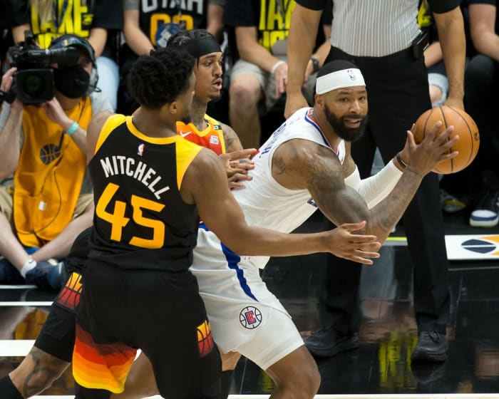 Donovan Mitchell (45) and Jordan Clarkson (00) try and trap Marcus Morris (8)